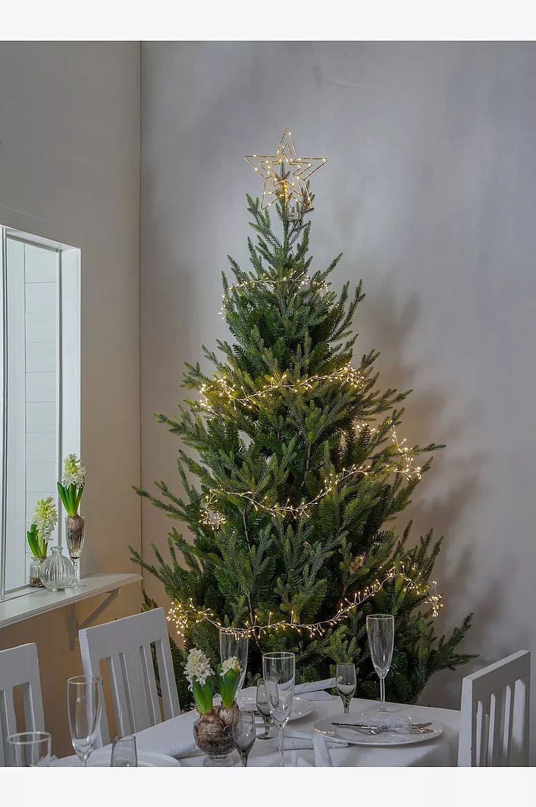 Juletrelys med stjerne Juletrestjerne med lys
